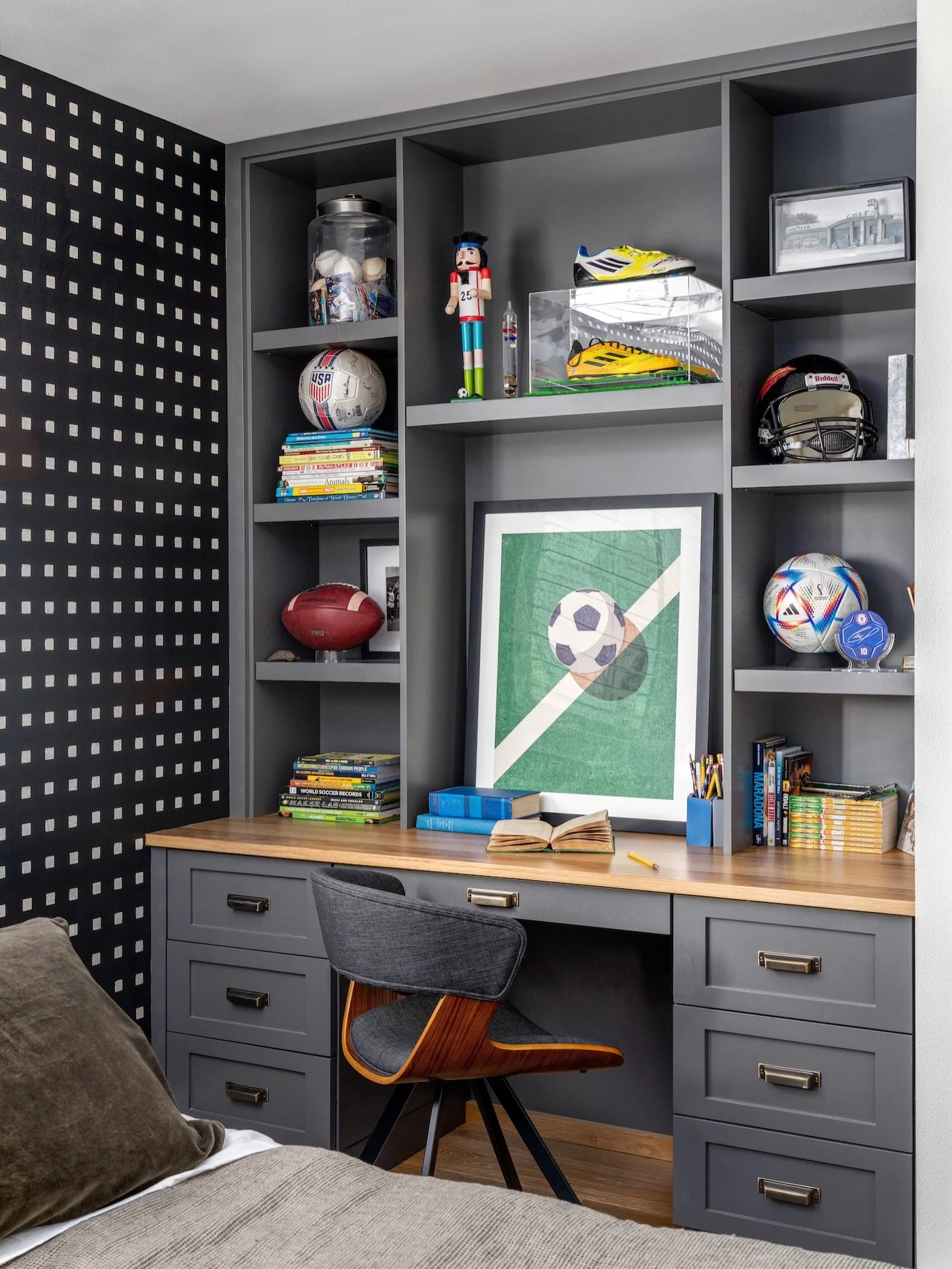 These are a few of our client&rsquo;s favorite things 🏈 🤖 

This boys bedroom is a great representation of showcasing personality, passions, and self expression through design. 

📷 @penlightmedia