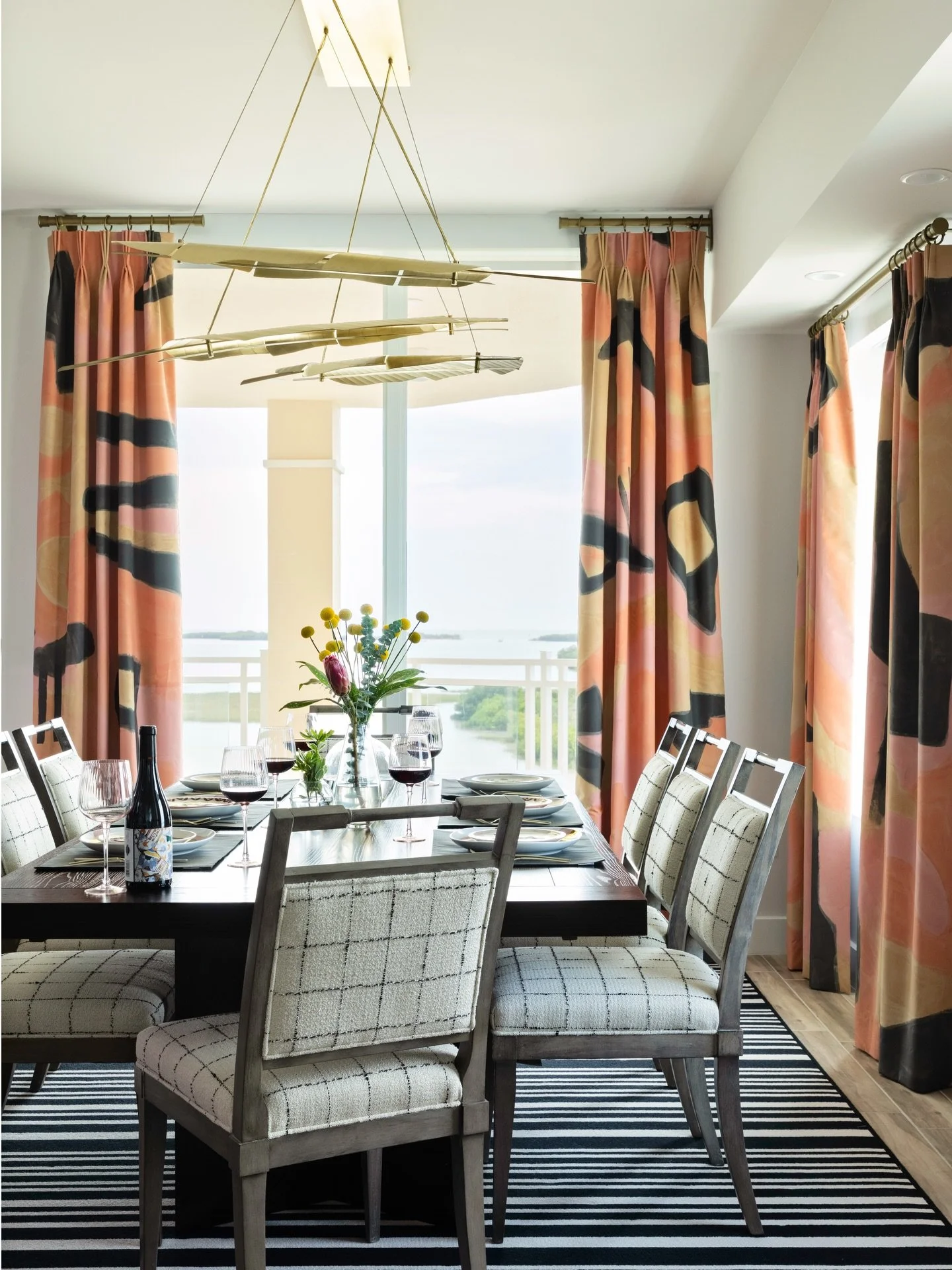 We filled this waterside vacation retreat with color, pattern, and texture from the Caribbean-inspired dining space to the kitchen&rsquo;s terrazzo tile backsplash. We brought a boutique hotel vibe to this Tierra Verde condo with functional performan