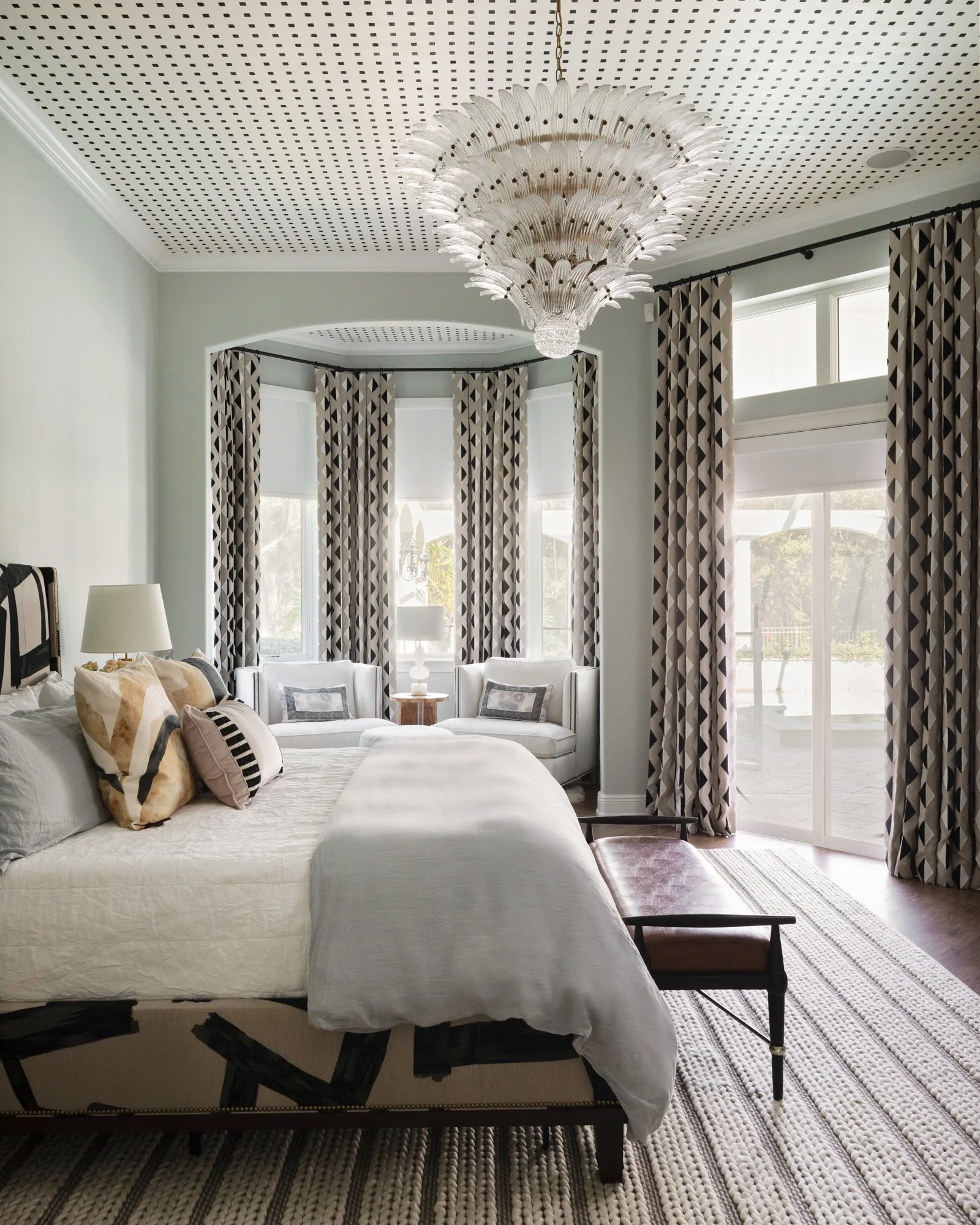 serene monochromatic room with bold patterns interior design Tampa