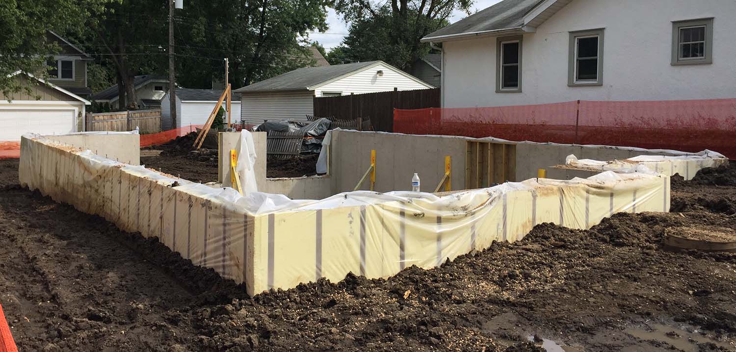 Backfill was placed yesterday as the top of the shoring was removed, and then it rained. The site is now a mucky mess, but with good weather next week framing will begin in earnest.