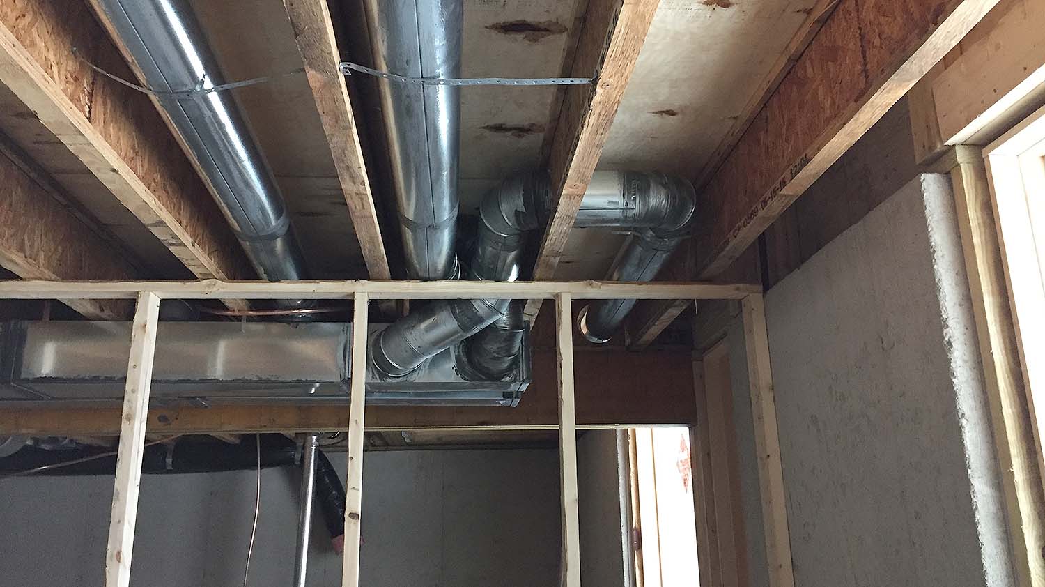 I think the duct drops are reasonable in the basement, but I've come to really see the advantage of going with floor trusses throughout. Next time...