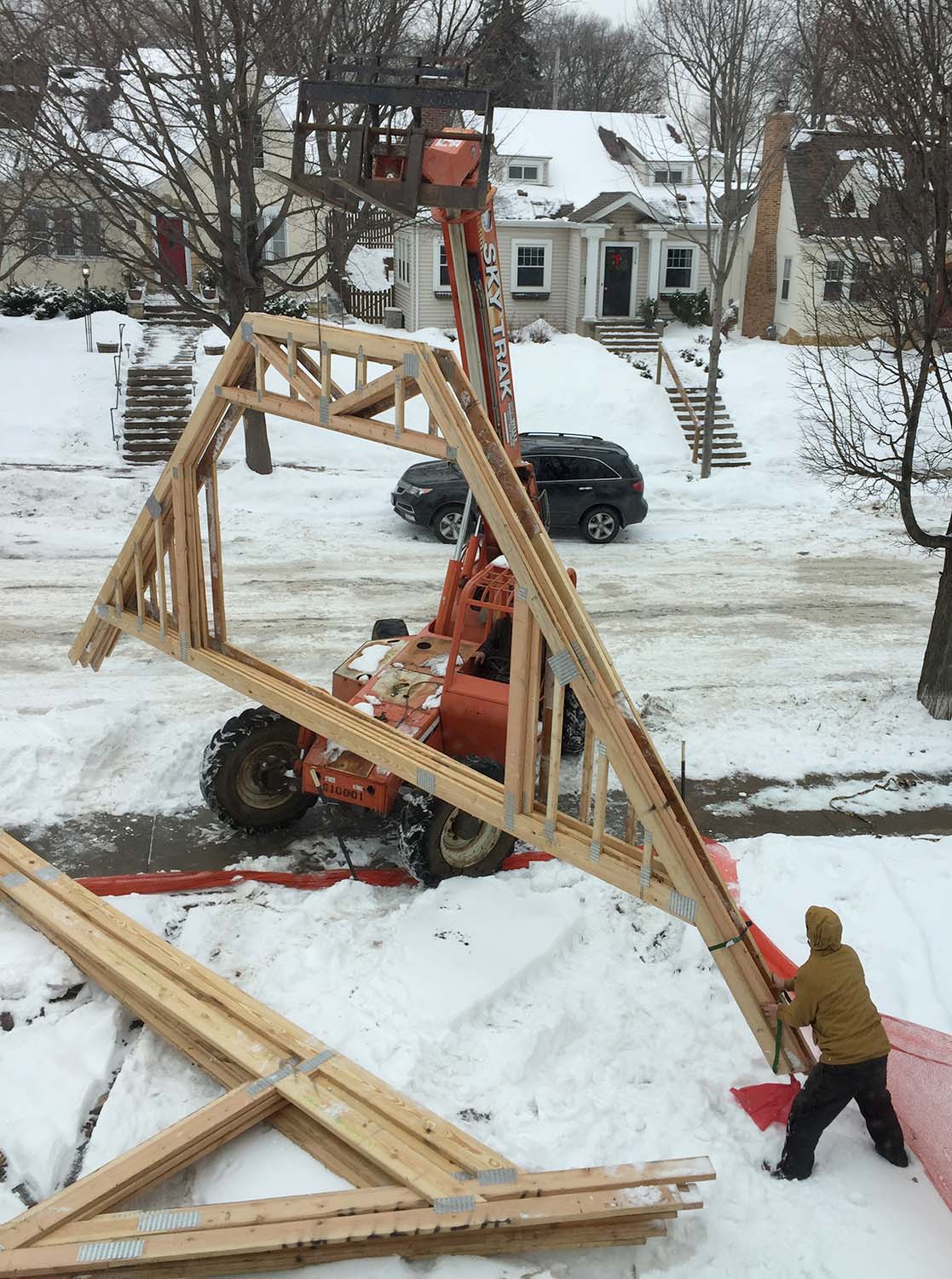 The garages have been in the front yard for several weeks, and the framers had great fun (not) getting them down the alley.