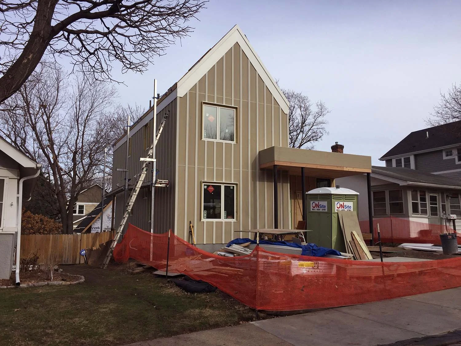 This is the northwest corner. The fiber cement board-and-batten siding will be painted a dark blue, with white trim.