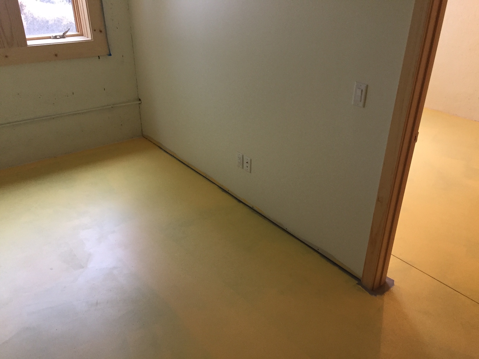 Painted concrete allows a room to be counted as "finished" for an appraiser, I learned.