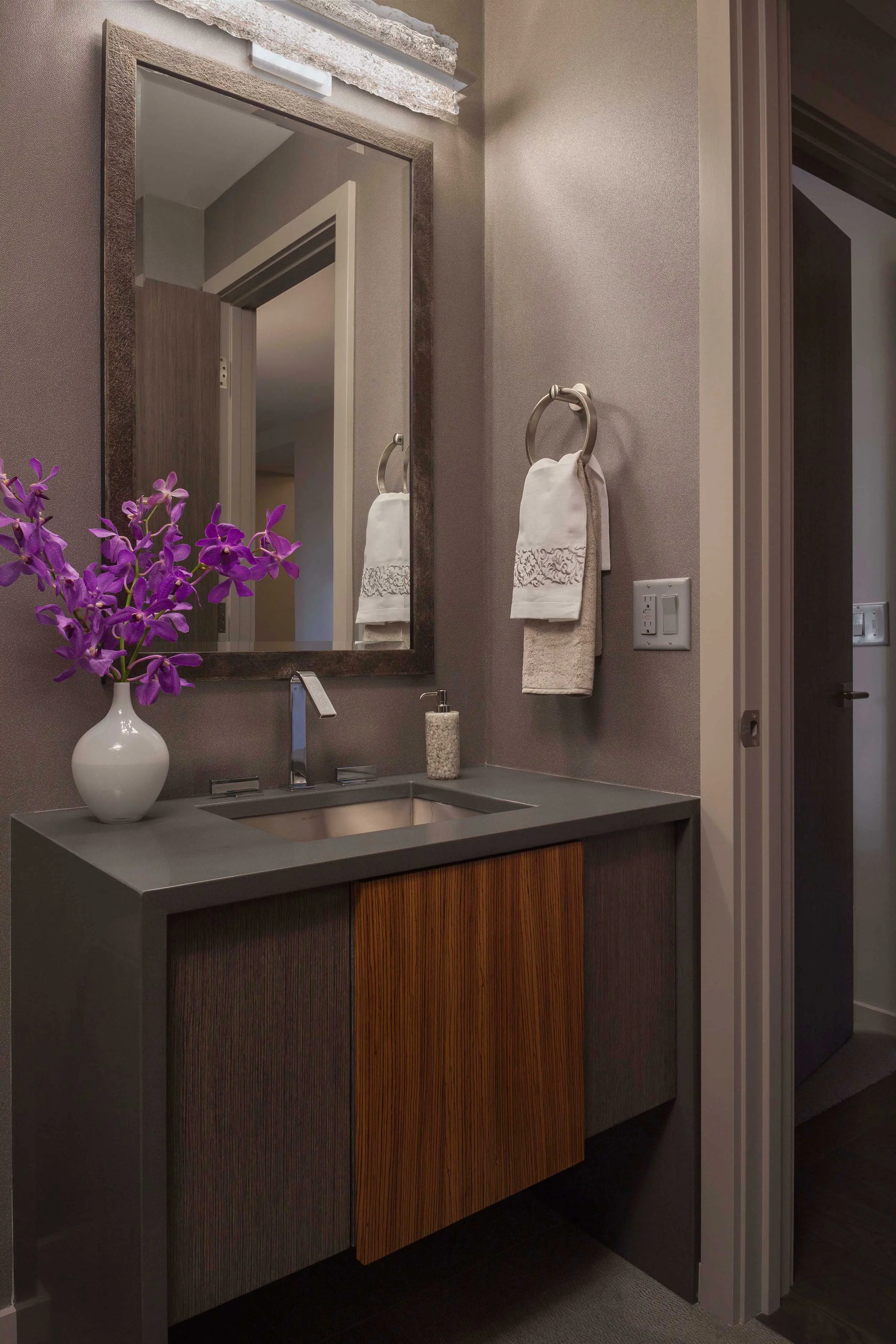 A small bathroom, embellished with careful detailing and unique finishes
