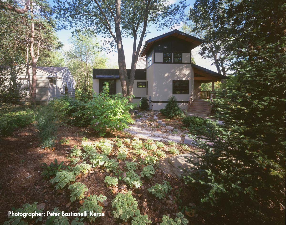 The street facade, with landscaping that included a dry "river".