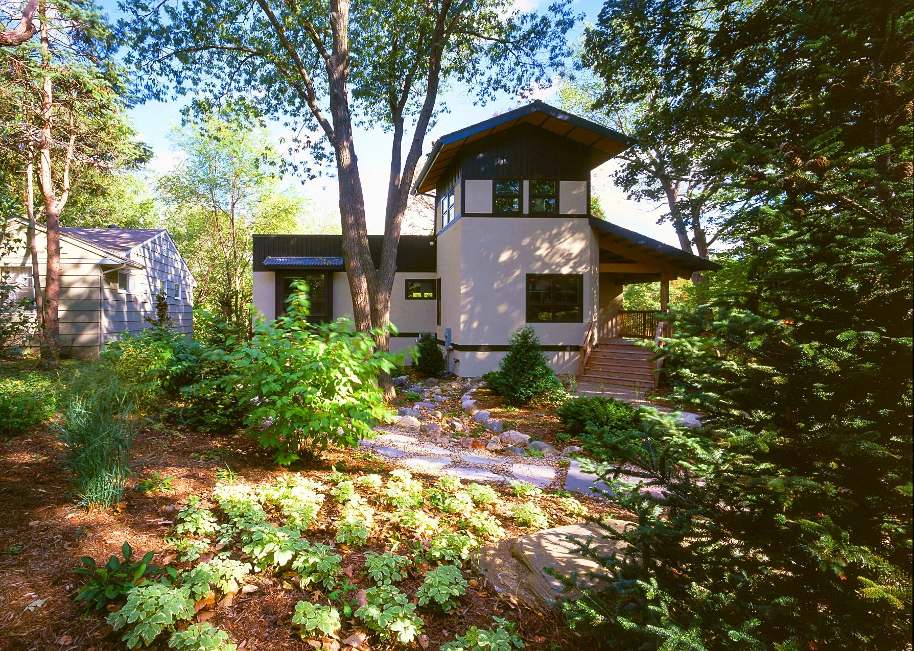 The landscaping on the street side featured a dry river, inspired by Japanese gardens.