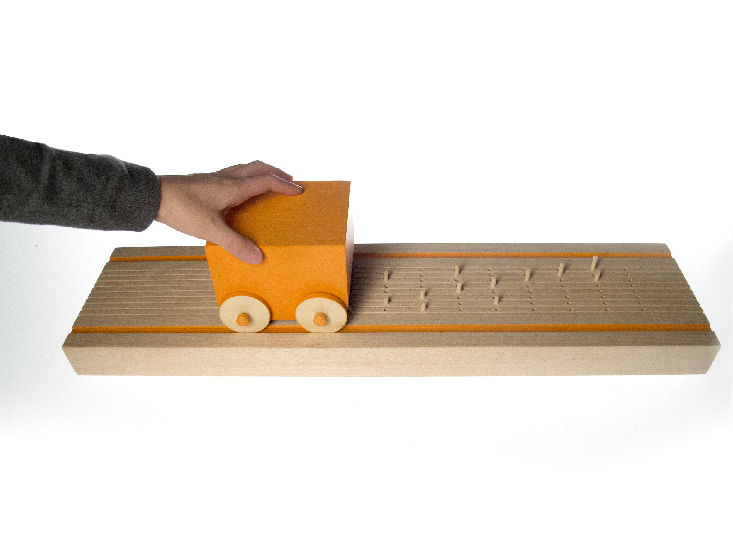 Push car along track to play composition