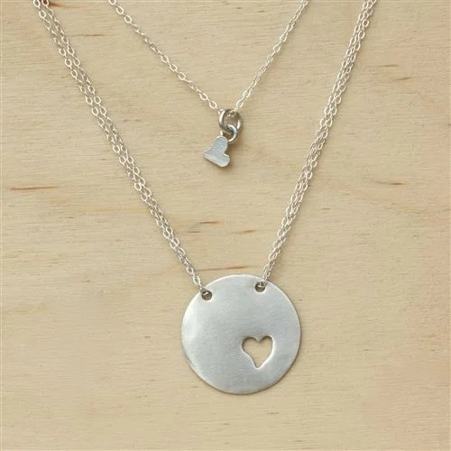 This Piece of my Heart Necklace from Swoon Studios is the most beautiful mother/ daughter necklace I have come across. It is an ideal symbol of remembrance and love. The Mother wears the sterling disc with cut out heart necklace, and the Daughter wears the teensy heart necklace (additional heart necklaces can be added if you have more than one daughter). This is just too cute-- I am Swooning again!