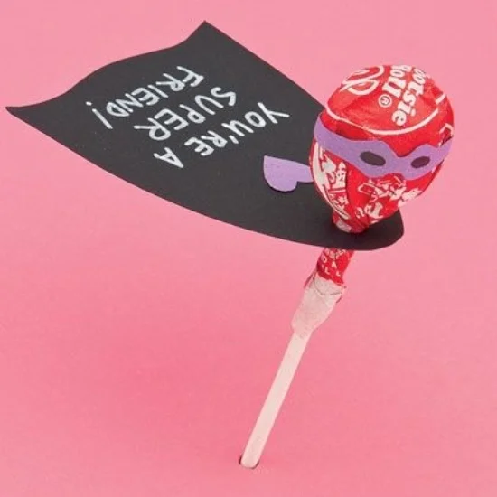 If your Child can hand out Sweets, they will be a hero when they hand out these Caped Cute-saders . These Supertreats are easy to make with free downloadable templates for masks and capes that your child can write a message on- from spoonful.com.