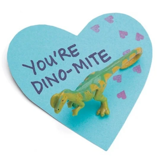 This DINO-MITE card shows, love is far from extinct. It is so easy to make, all you need to do is cut out a heart shape using card stock, write a message, and tack a small plastic dinosaur to the heart. There will be Big Love for this Valentine Card- from spoonful.com.