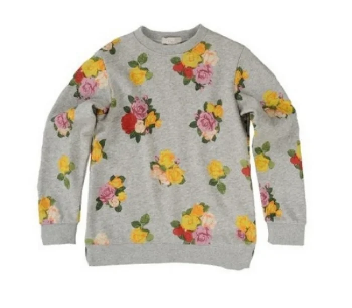 This Stella McCartney Mimi Sweatshirt is an organic cotton Sweatshirt in classic grey heather with an Allover Roses Print and an asymmetrical hem. Very Cool!