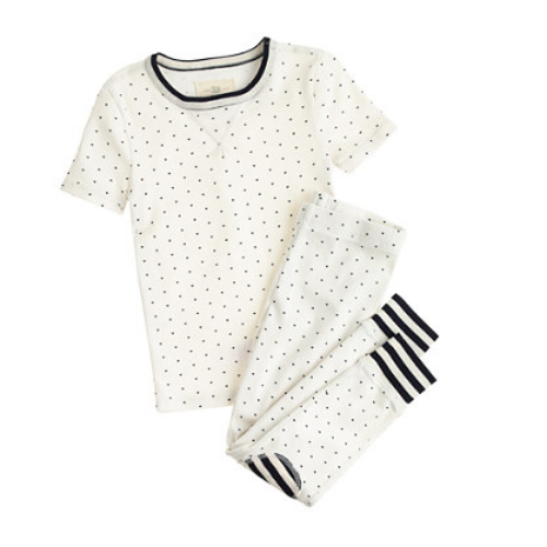 These J.Crew GIRLS' SLEEP SET IN TINY HEARTS are cute and cozy for sleeping soundly, and have lots of little hearts and a bold stripe collar and trim.