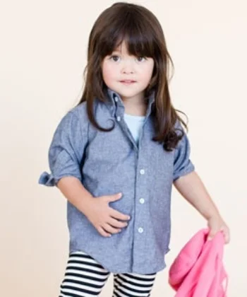 This American Apparel Kids Chambray Long Sleeve Button-Down is their classic Chambray long sleeve button-down made for little ones.