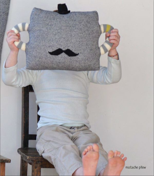 This BlaBla Kids Hold Me Tight Mustache Pillow is the Pillow my son has & loves! It is hip and cute at the same time with little black top hat and mustache.