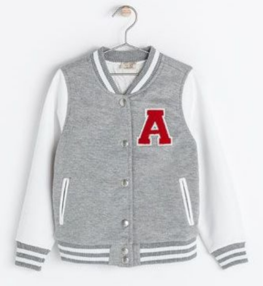 This Zara CONTRASTING JACKET WITH FAUX LEATHER SLEEVES is a cute and cool girls jacket with traditional varsity details of snaps at the front, "A" embroidered patch at left chest, and striped ribbed neckline, cuffs and hem.