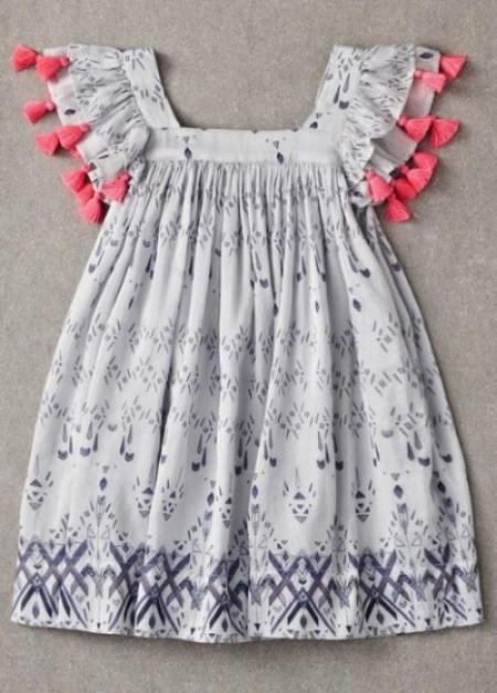 This Nellystella Chloe Dress Tribal Print is 70% cotton and 30% silk, which is soft and luxurious fabric your daughter will love wearing. This Dress can be dressed up with Fancy Sandals, or worn for everyday wear with Birkenstocks. I love the tassels on the flutter sleeves of this Pretty Dress.