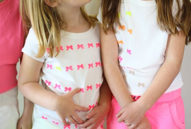 This DIY Neon Bow T-Shirt For Girls from Four Flights of Fancy is absolutely adorable. This Bow T-Shirt is easy as this, use a bow stamp and neon color fabric paint, and you too can create an allover Bow printed T-Shirt for your little Princess (just make sure to use masking tape as a line guide to keep your bows straight).