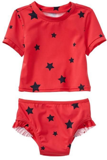 This GAP Star ruffle rashguard two-piece has short sleeves with banded cuffs, mock neck, bikini bottom with ruffle trim at leg openings, and allover Star Print. It also has UPF 50+ to protect your little one's skin from the sun on hot Summer Days.