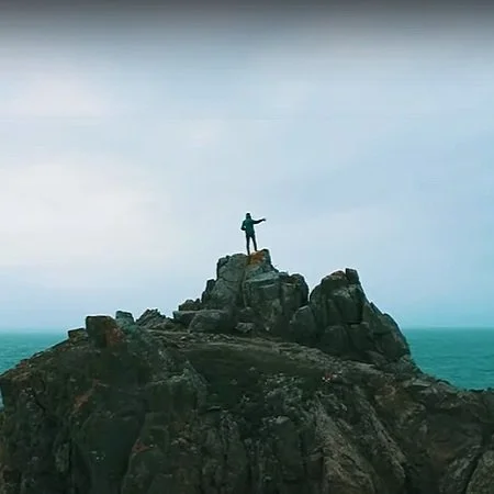 guy+on+rock.jpg