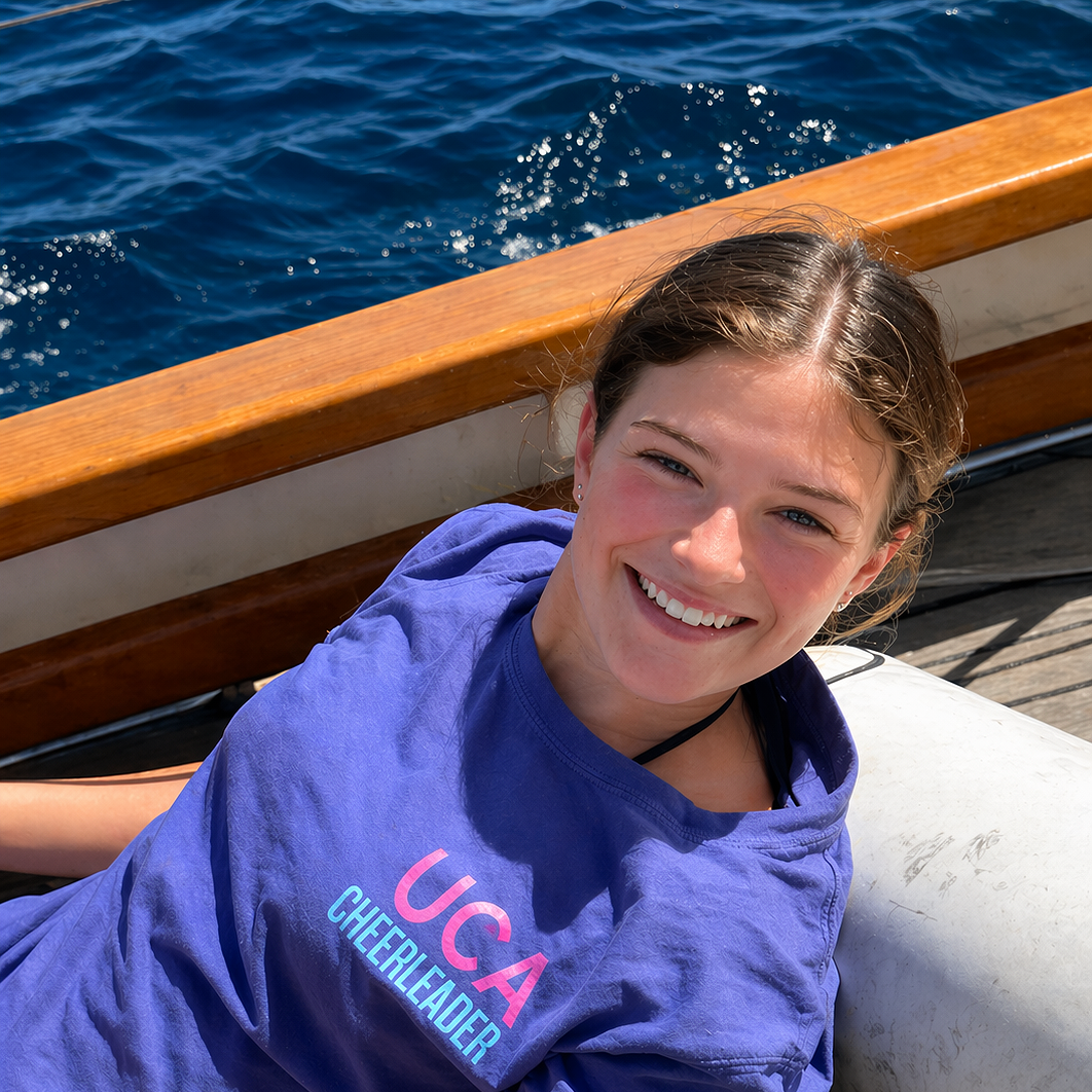 smiling+girl+on+boat+deck+Apr+24%2C+2026%2C+05_14_42+PM.png