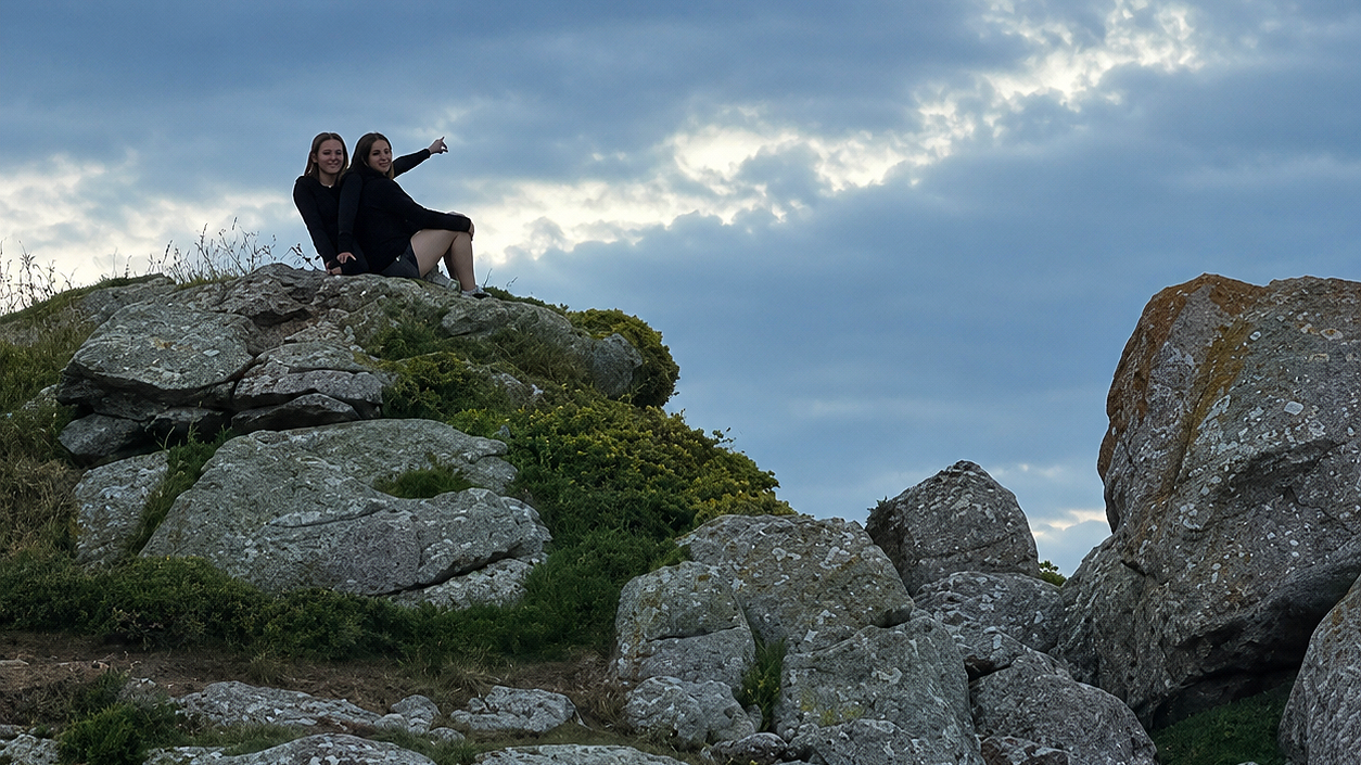 ChatGPT Girls on granite outcropping.png