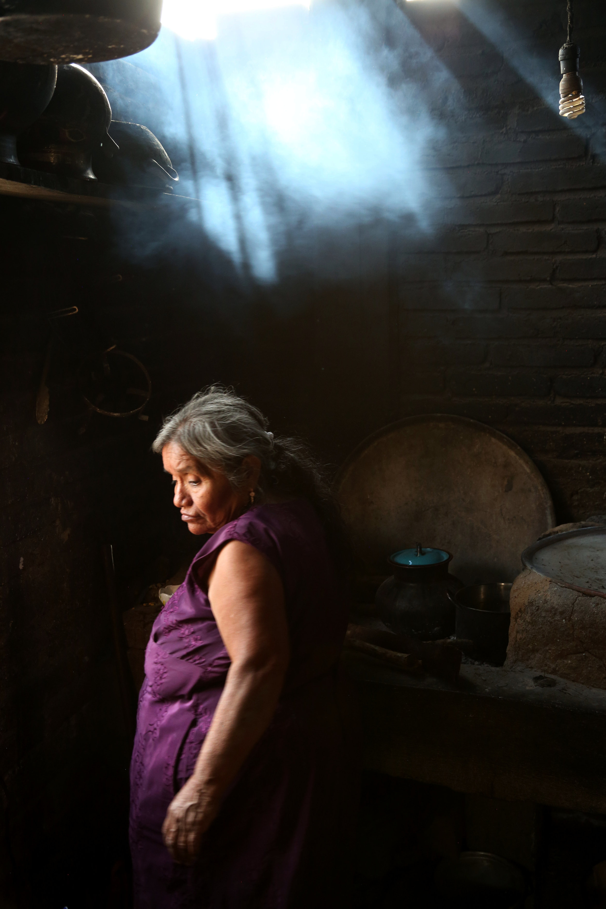  Teresa Raymundo cooks stew at her home in  San Juan del Rio, Oaxaca.  