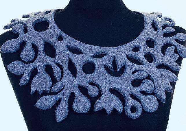 carved felt collar.