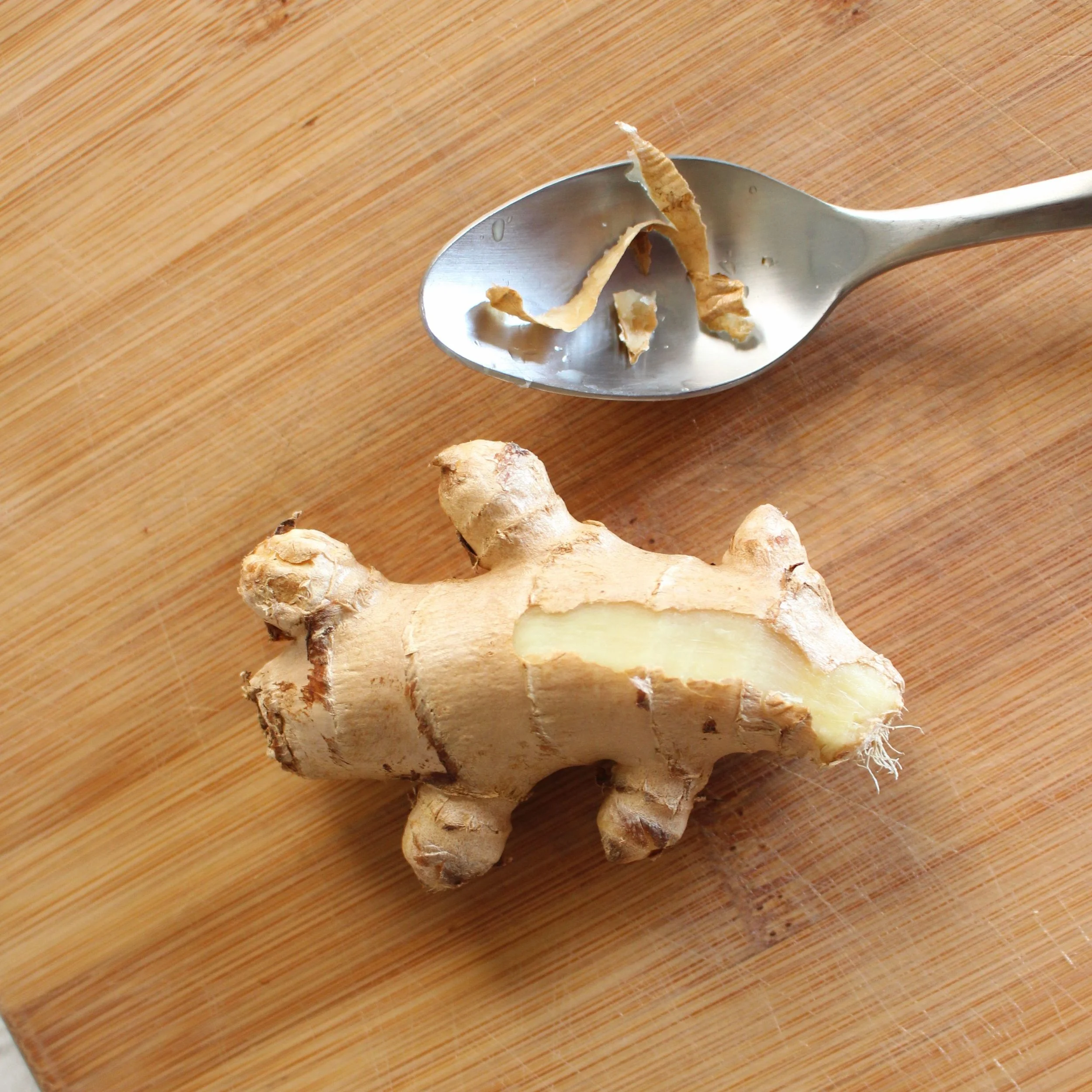 Peel ginger with a spoon
