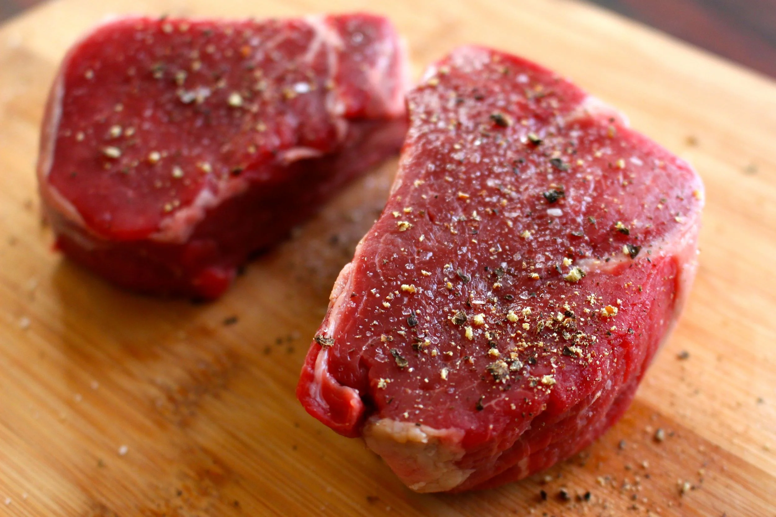 Take your steaks out of the fridge and season them at least 30 minutes before cooking.