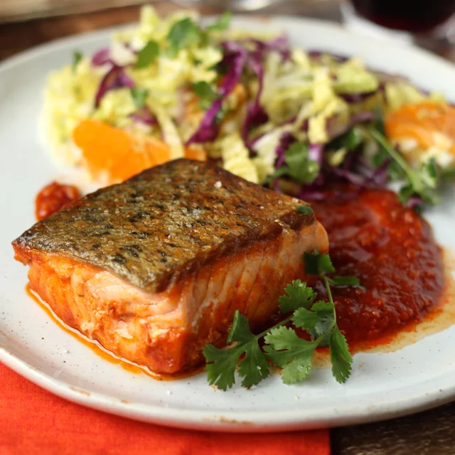 Salmon in Chraimeh Sauce with Winter Slaw