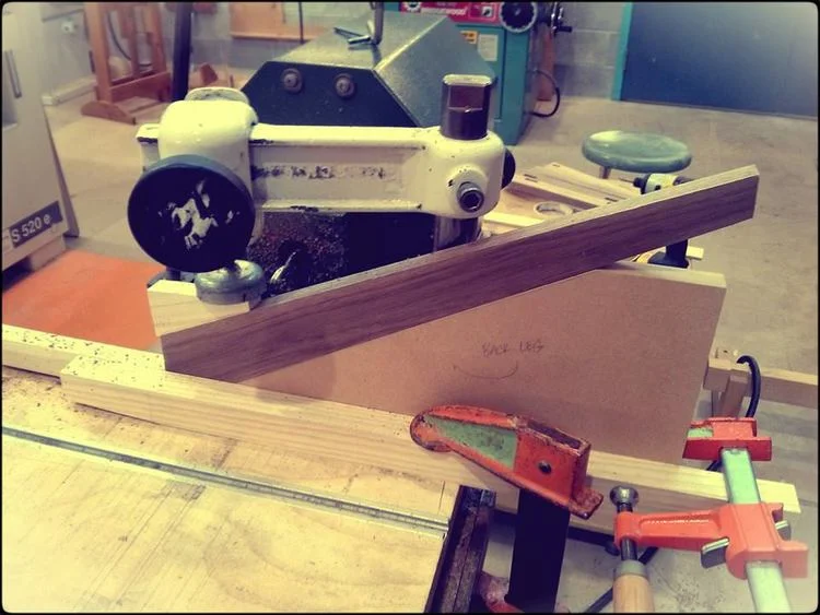 Cutting mortise for Faccetta side chair legs.