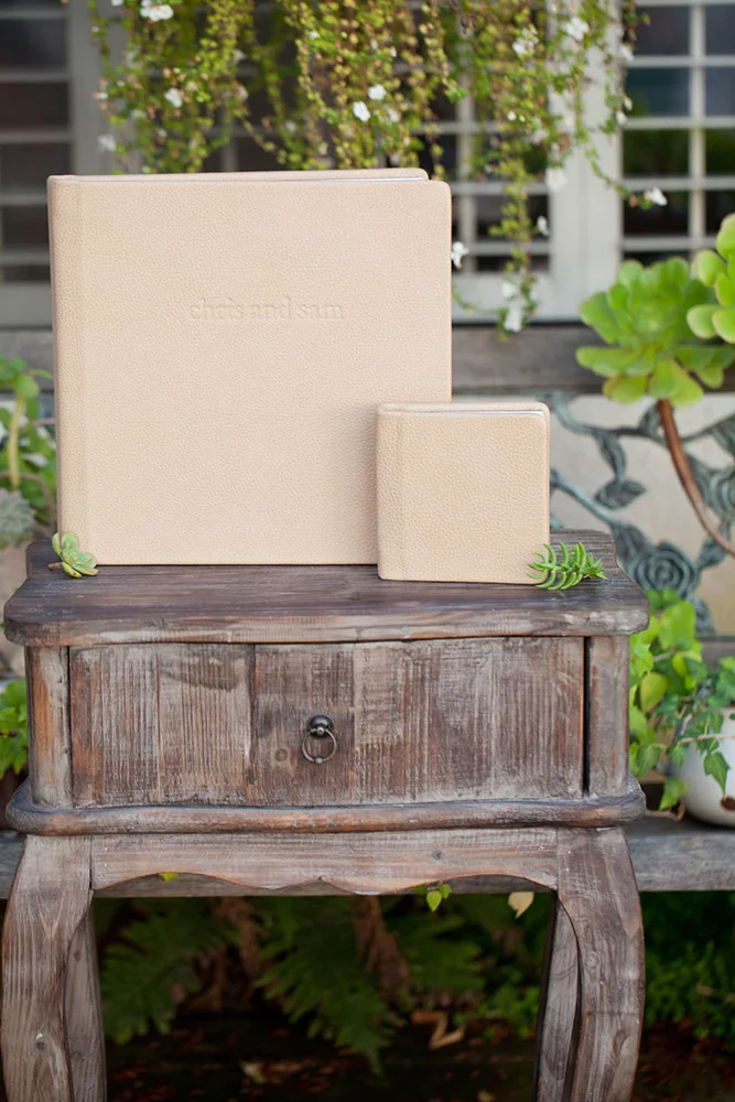 Mini 6x6 album with a debossed 12x12 leather album.