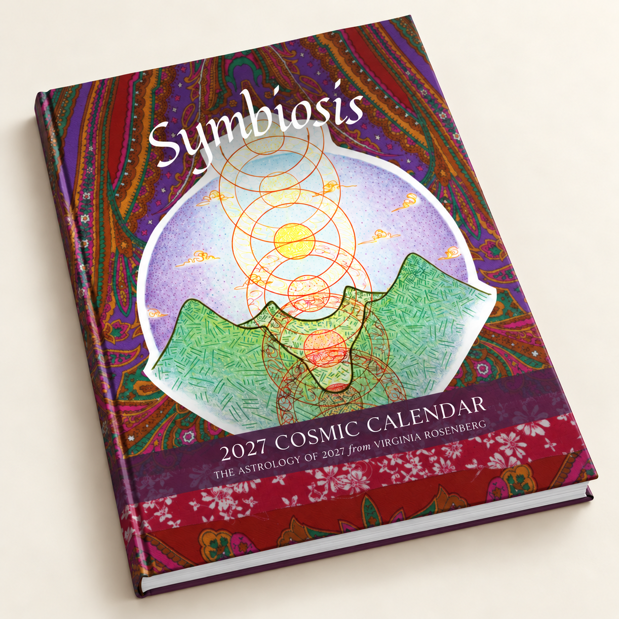 Symbiosis 2027 Cosmic Calendar hardcover, featuring colorful original artwork by Jillian Sinnott