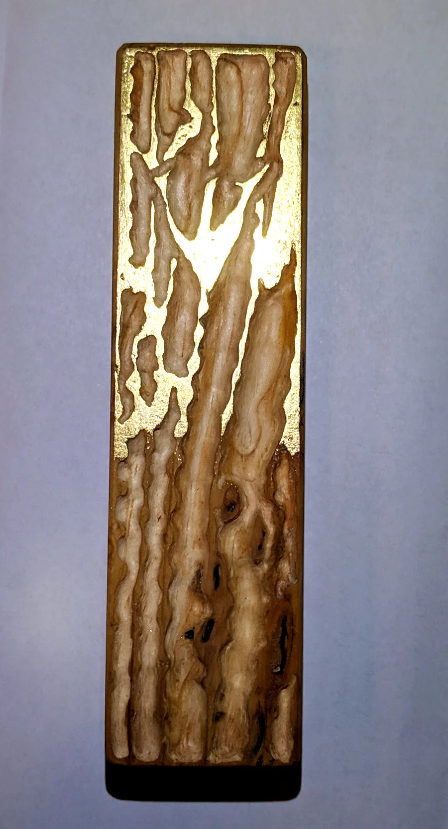 Gilding half done