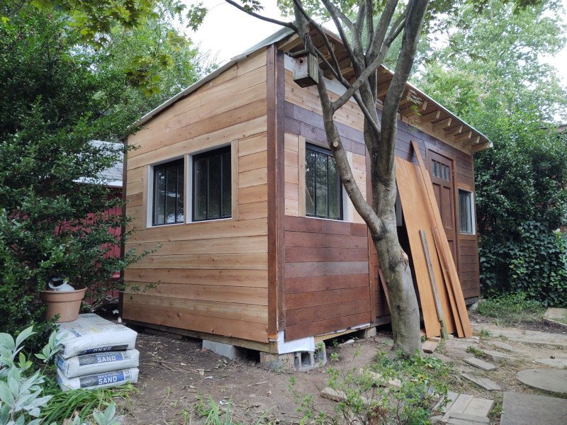 Exterior cedar siding completed