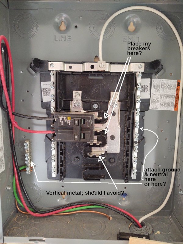 Electric panel installed by my electrician, with my questions