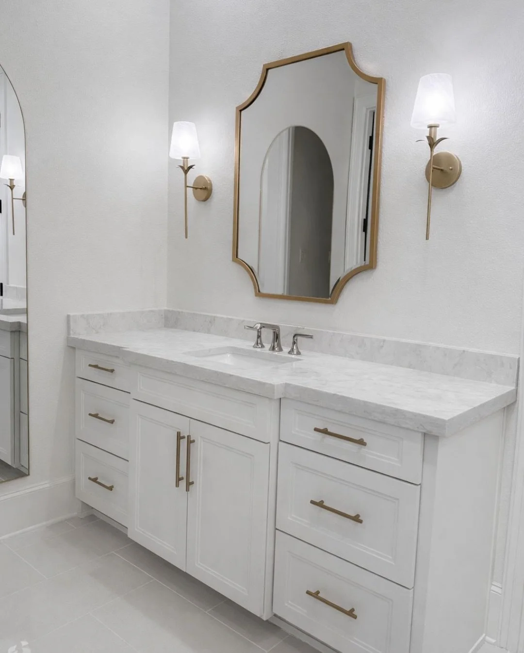 Master Bath Renovation &mdash; Refined &amp; Reimagined

What was once an oversized jetted tub and segmented layout is now expanded, open, and intentional.

Every selection was chosen to feel timeless:
&bull; Marble surfaces with soft movement
&bull;