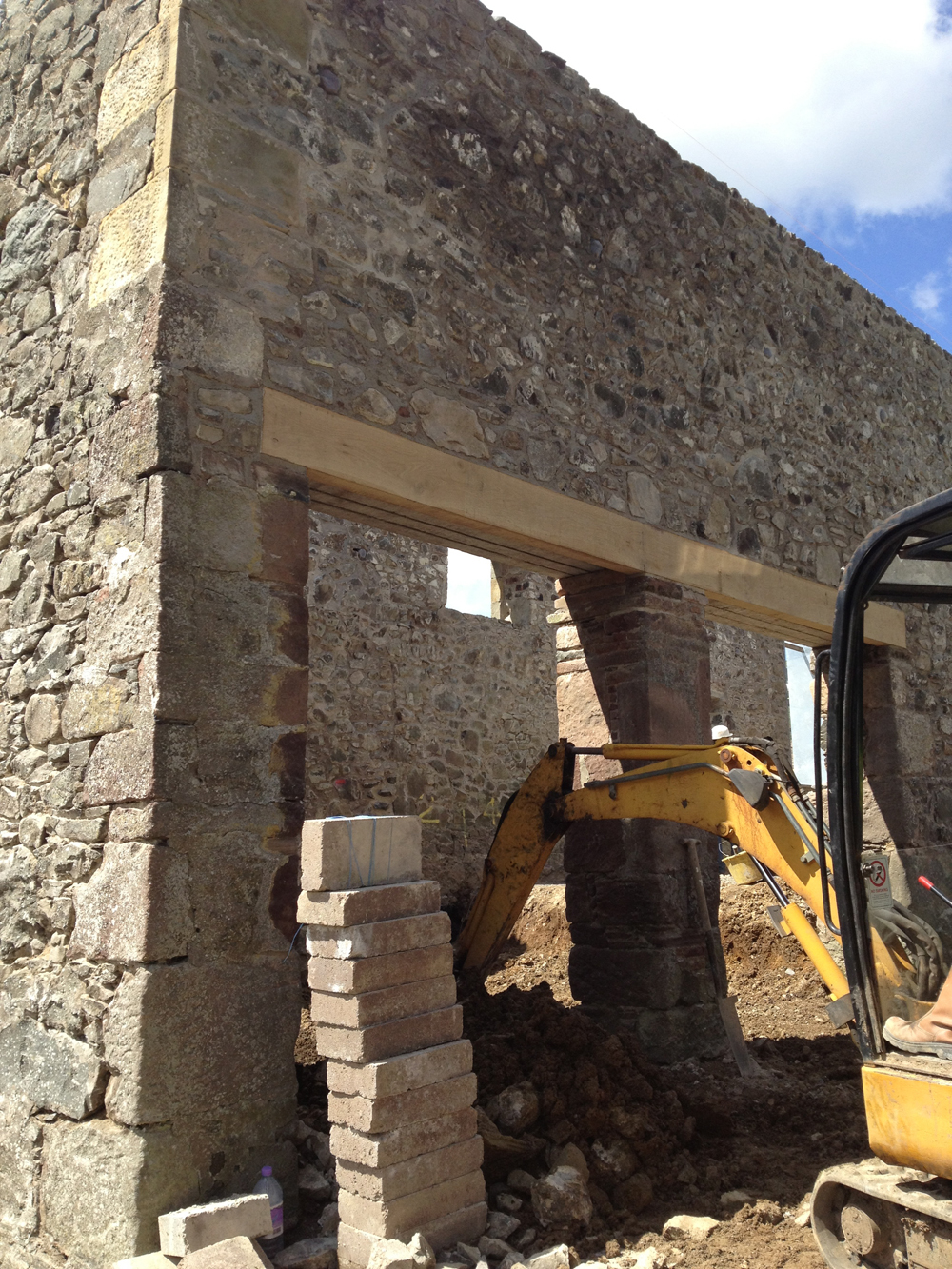  Replacement oak lintel being installed 