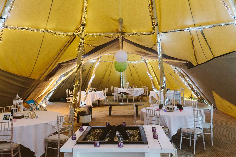 Marquee interior set out for a wedding drinks reception