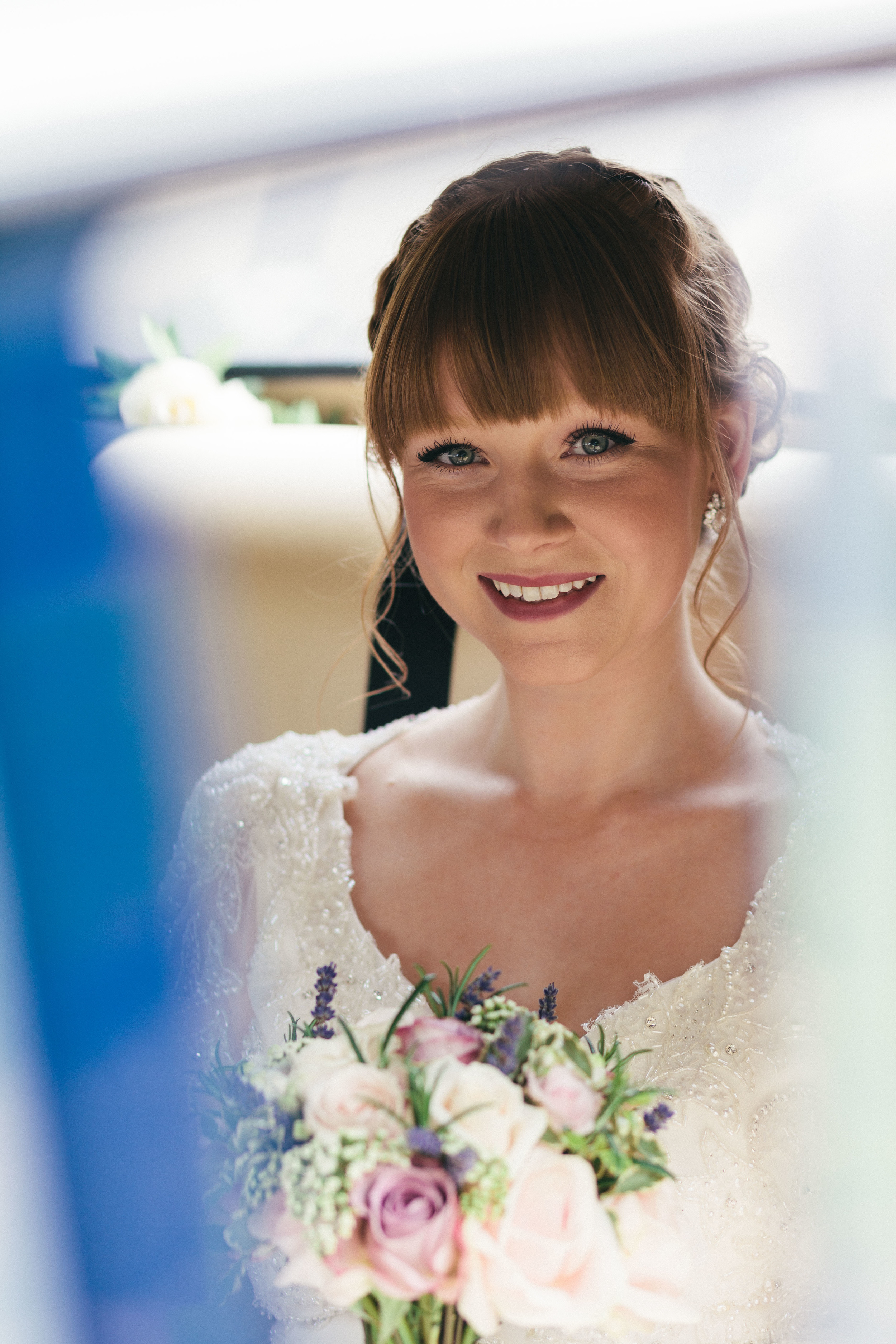 Newcastle Wedding Photographer Malmaison Hotel Bride arriving at ceremony by car holding flowers