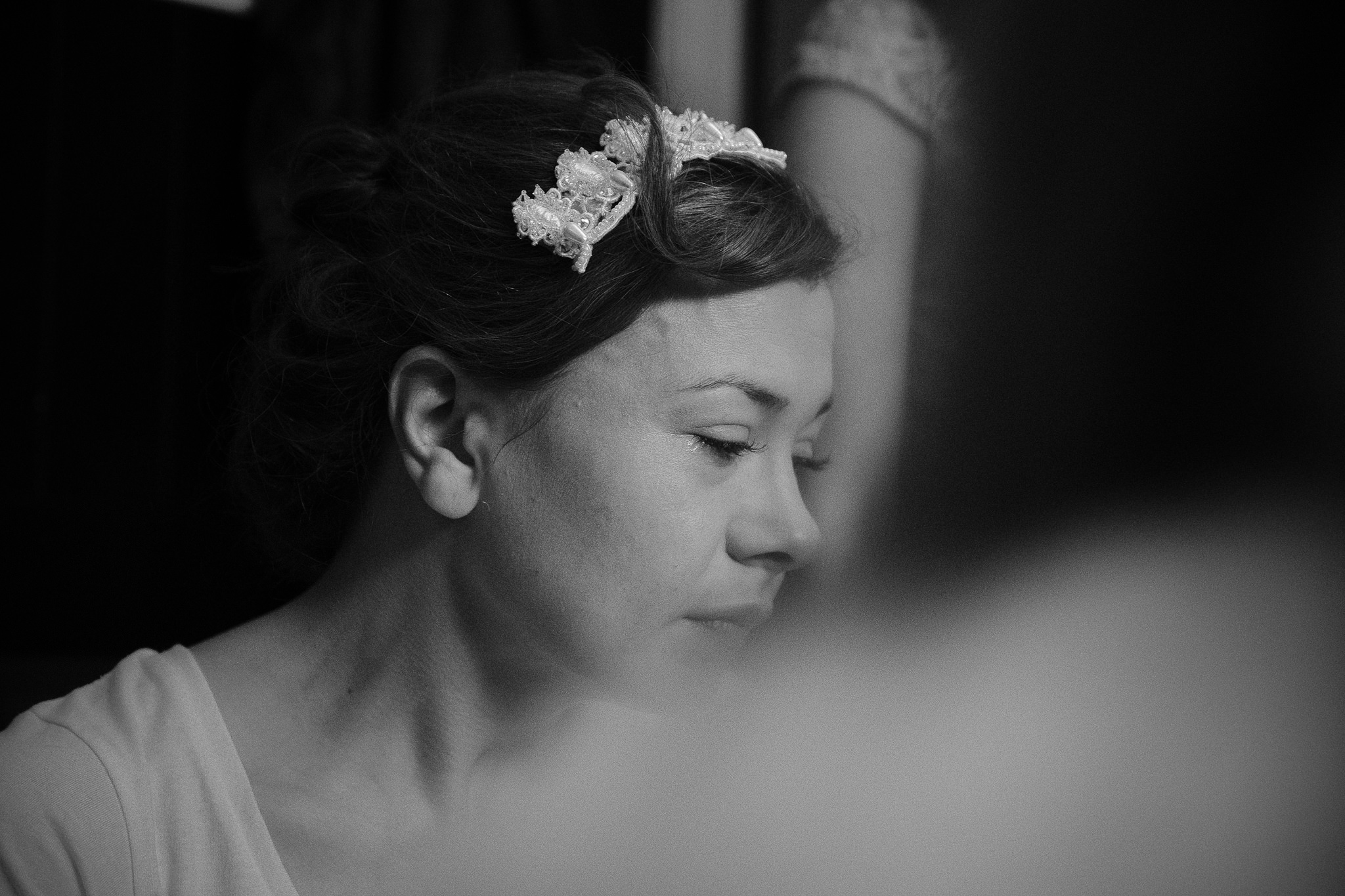 Black and white photo of the bride crying before her wedding in Northumberland