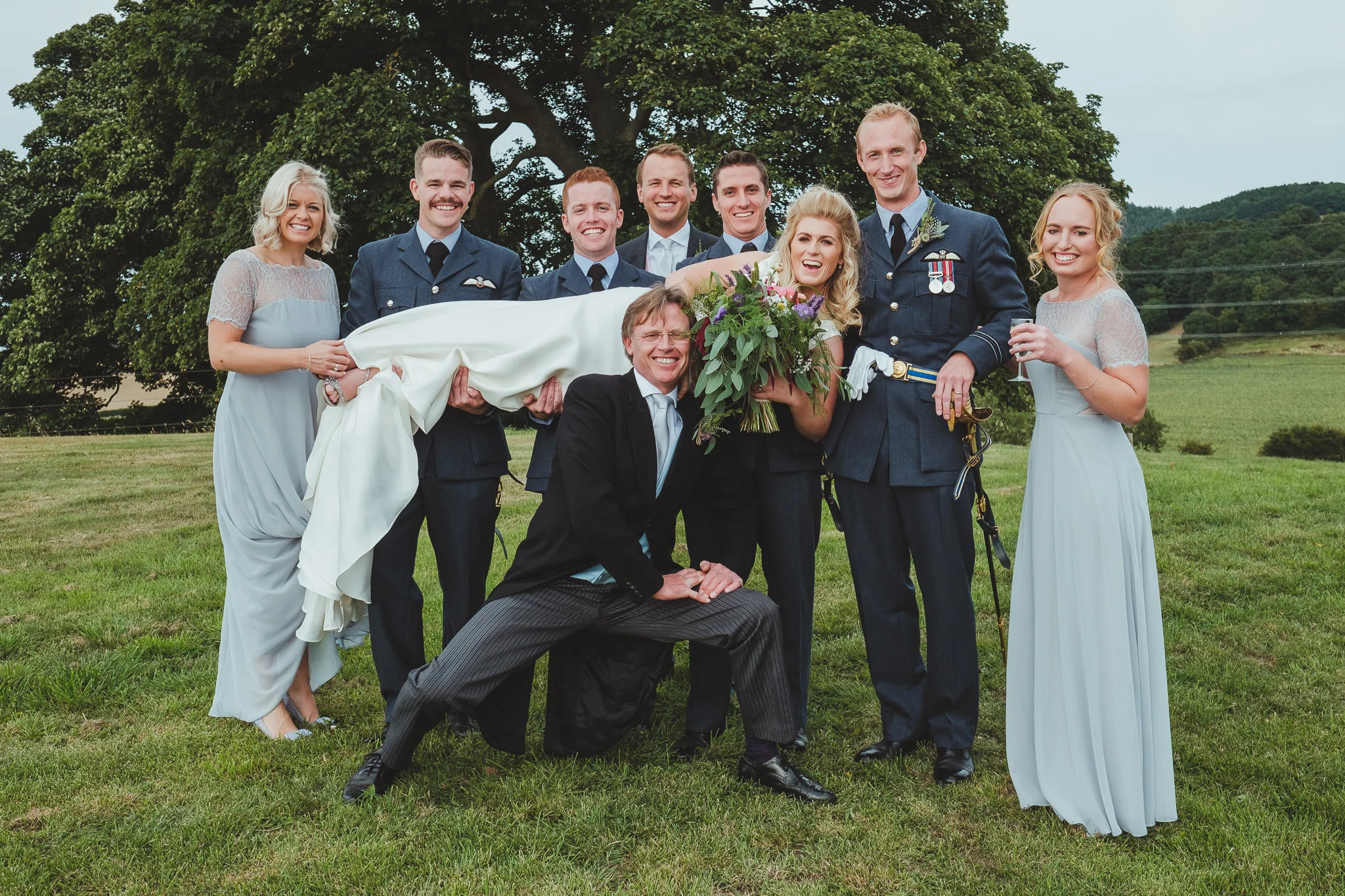 I have absolutely no idea what is going on in this group shot at Zoe and Ed’s farm wedding in Yorkshire!