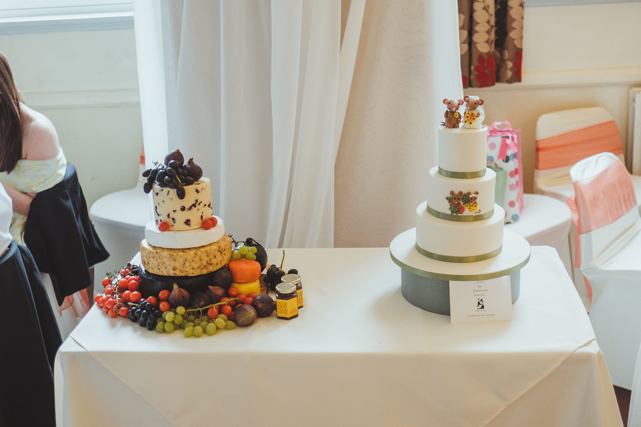 Wedding cake and cheese wheel