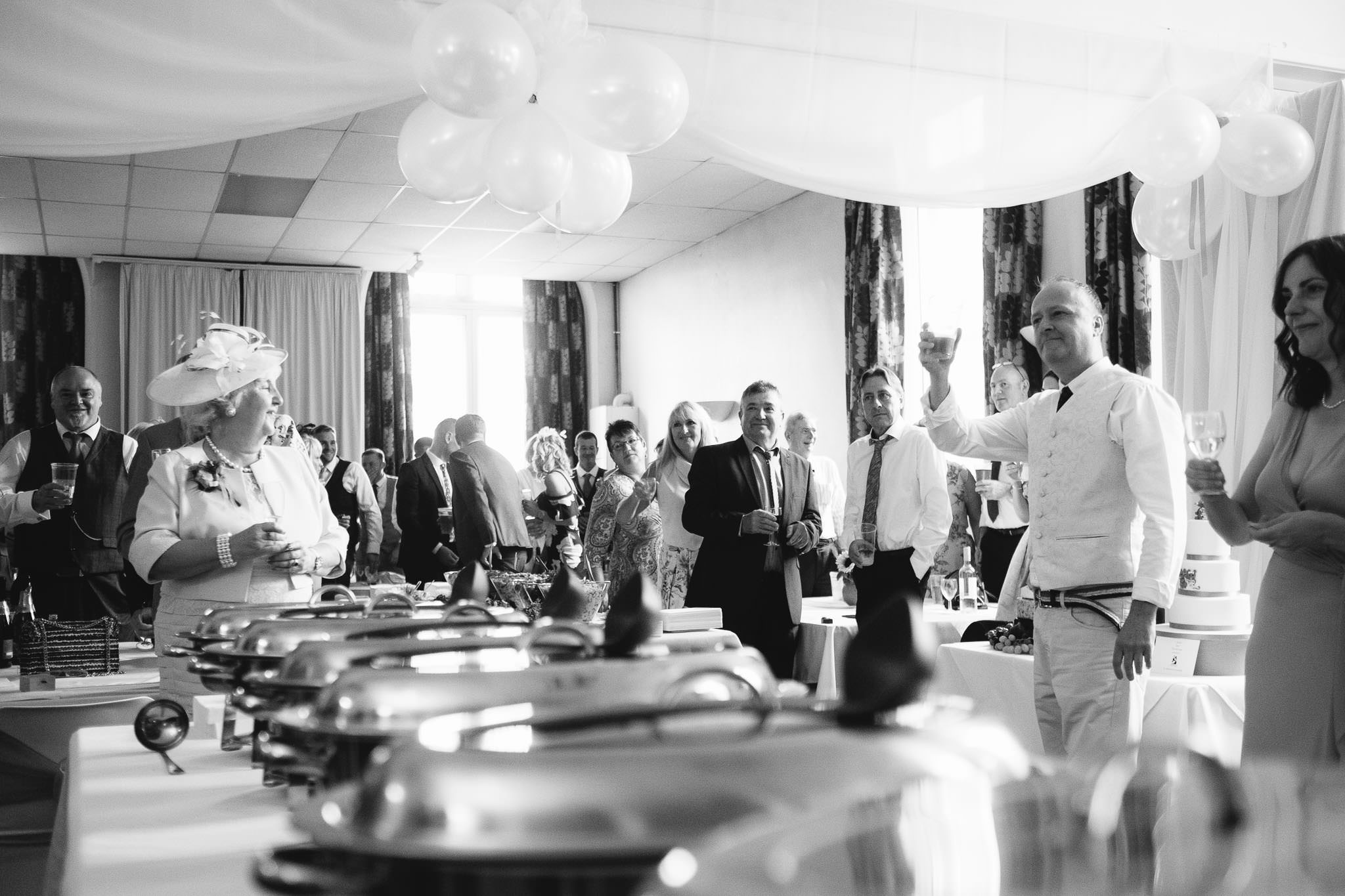 A black and white photo of a wedding speech at the Wylam Institute