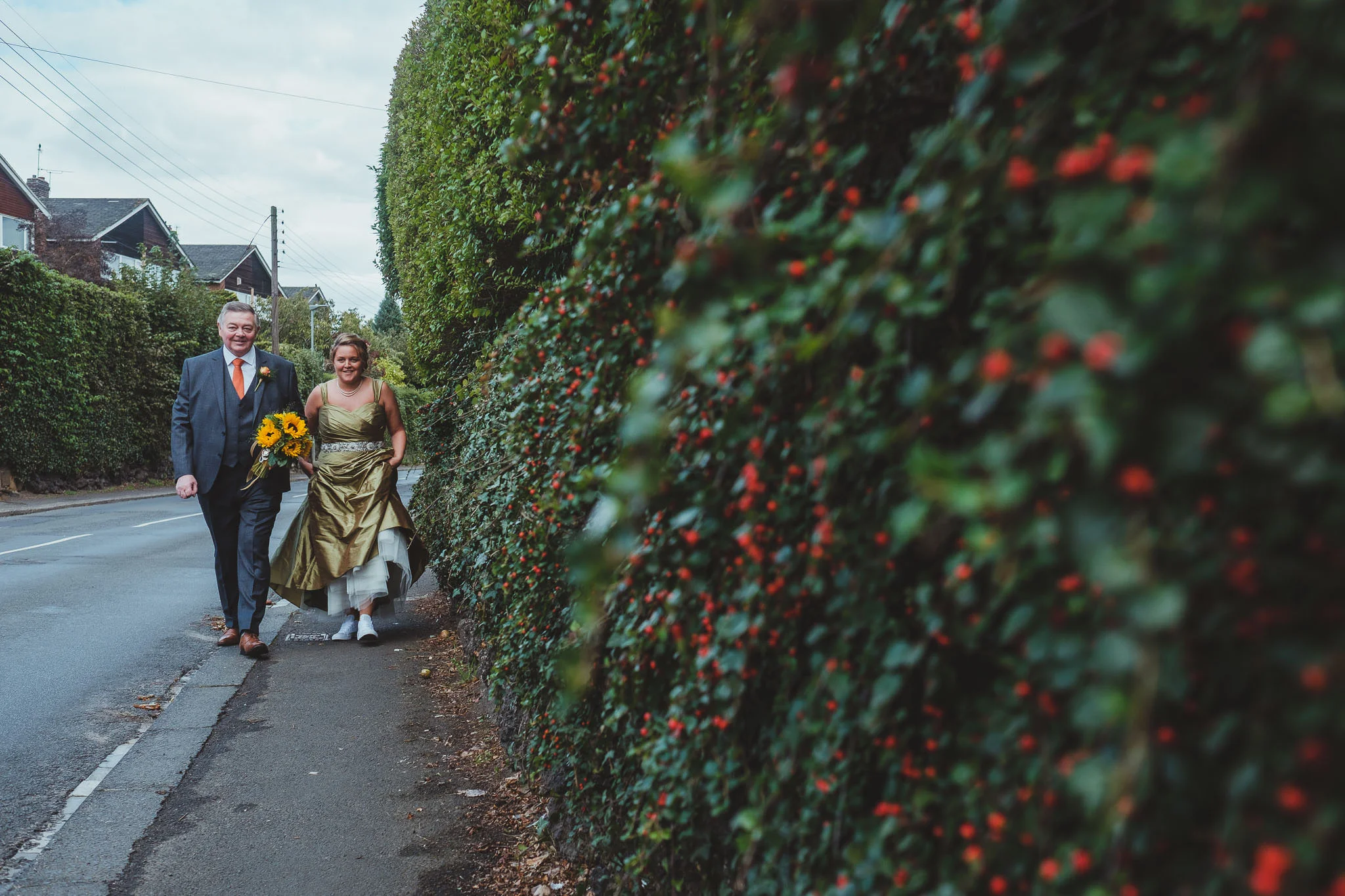 Emma and her dad walking to the church in Wylam