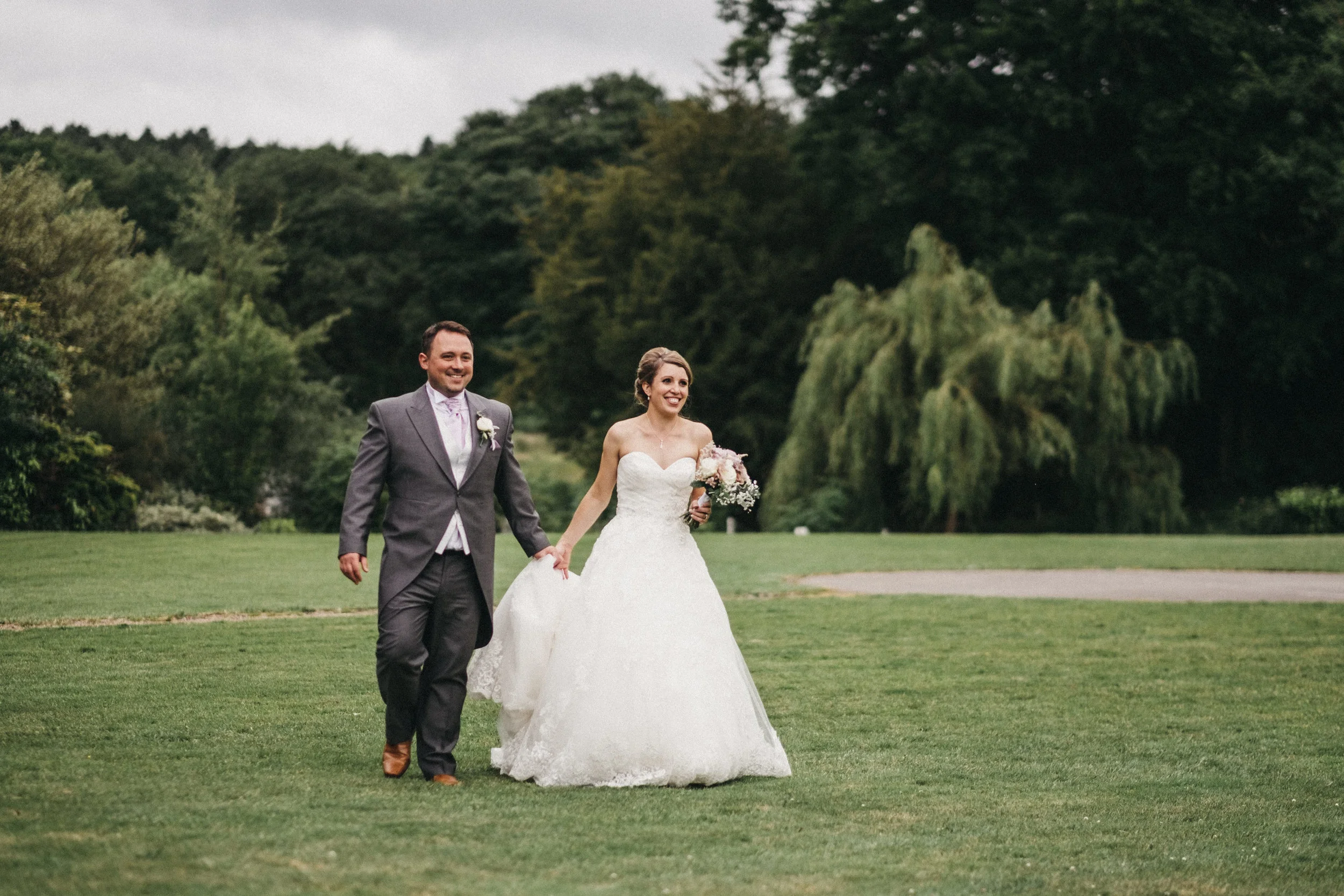 A relaxed, natural photograph of Rebecca and Ben at Bagden Hall in Yorkshire