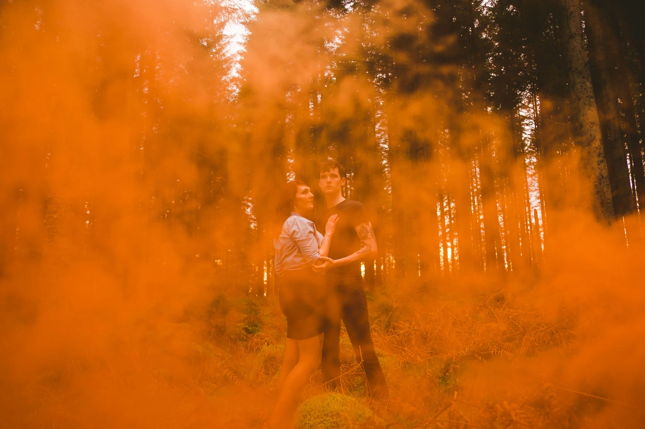 I took Sarah and Billy up to Kielder water and forest park for their shoot. The bright orange was a good contrast for the green woodland but the smoke was too thick in my initial shot.