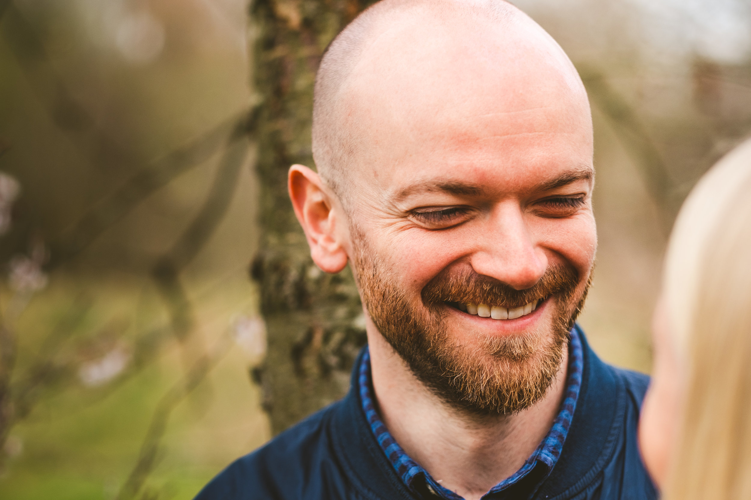 Close up of groom laughing during pre-wedding session in Newcastle
