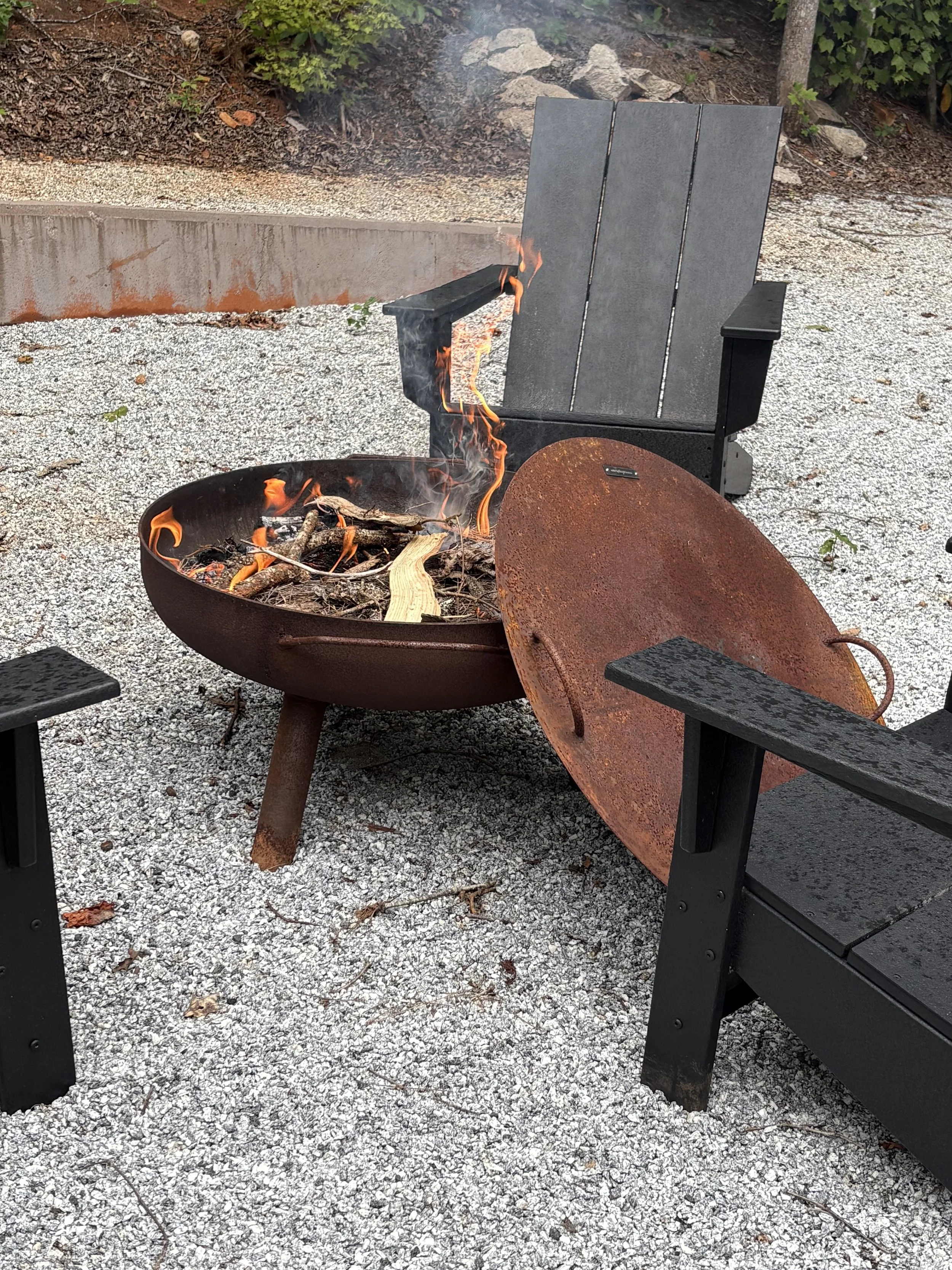 I was lucky that they have a very safe firing environment with a metal fire ring with lid. All the pieces were buried under dry leaves and pine needles, then logs were placed on top to make fire.
